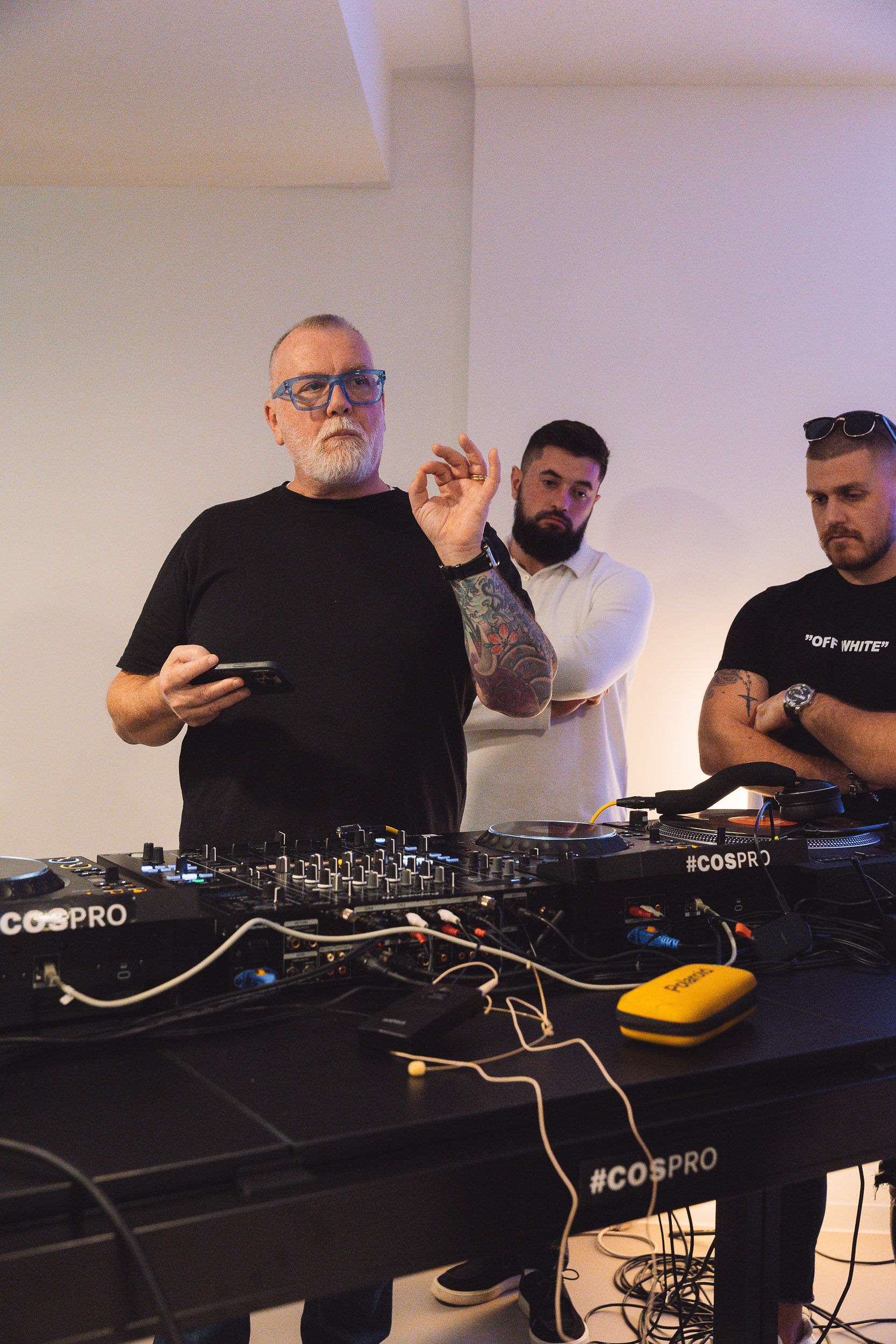 Matthew Bee and two team members at #COSPRO branded Pioneer DJ decks during Cosmic Production DJ Masterclass