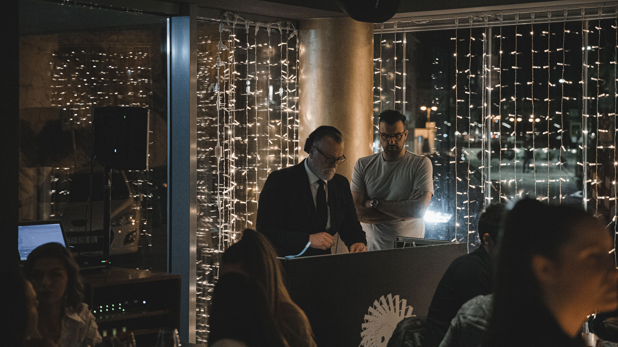 DJ Lomax performing at Pioneer DJ controller at Bokamorra cocktail bar in Split