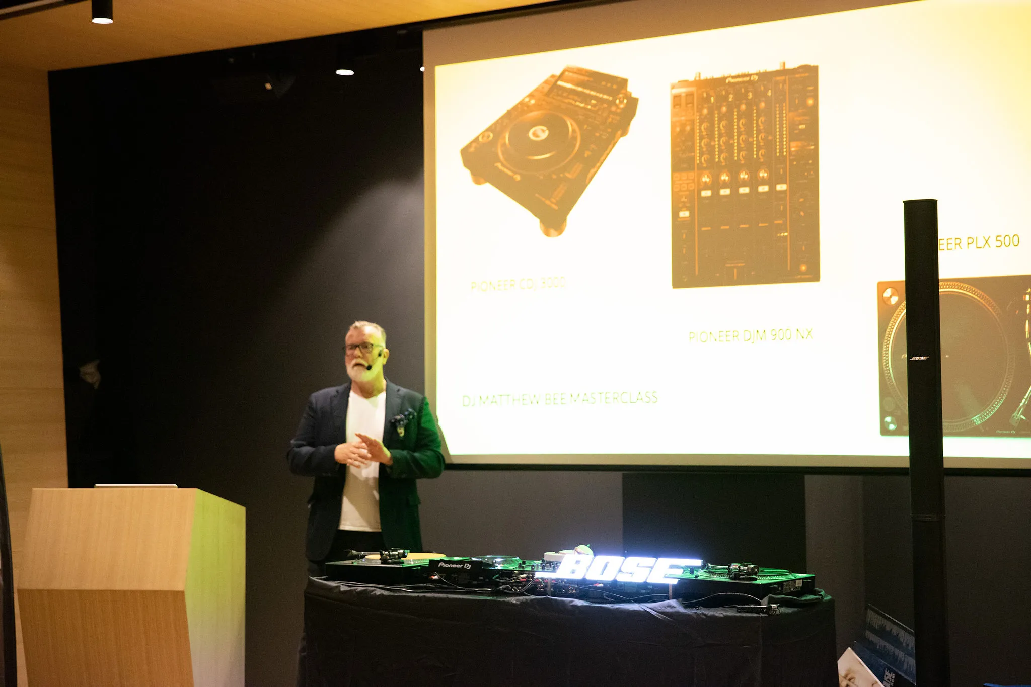 Matthew Bee presenting Pioneer DJ equipment overview at the Cosmic Production DJ Masterclass with Bose speaker system