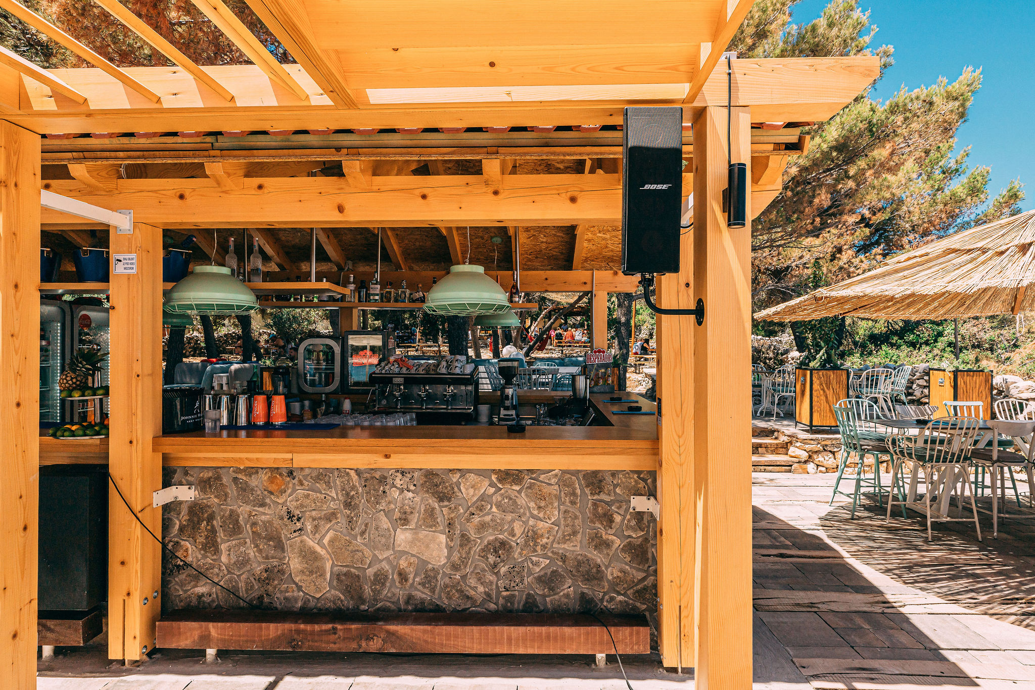 Haven Beach Bar outdoor bar area with Bose audio integration — architectural photography by Cosmic Production