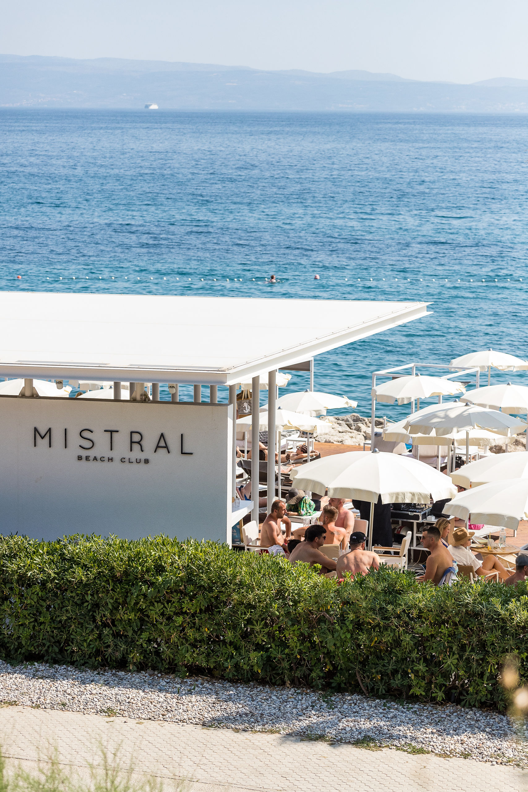 Mistral Beach Club daytime exterior with branded signage and Adriatic Sea at Radisson Blu Split
