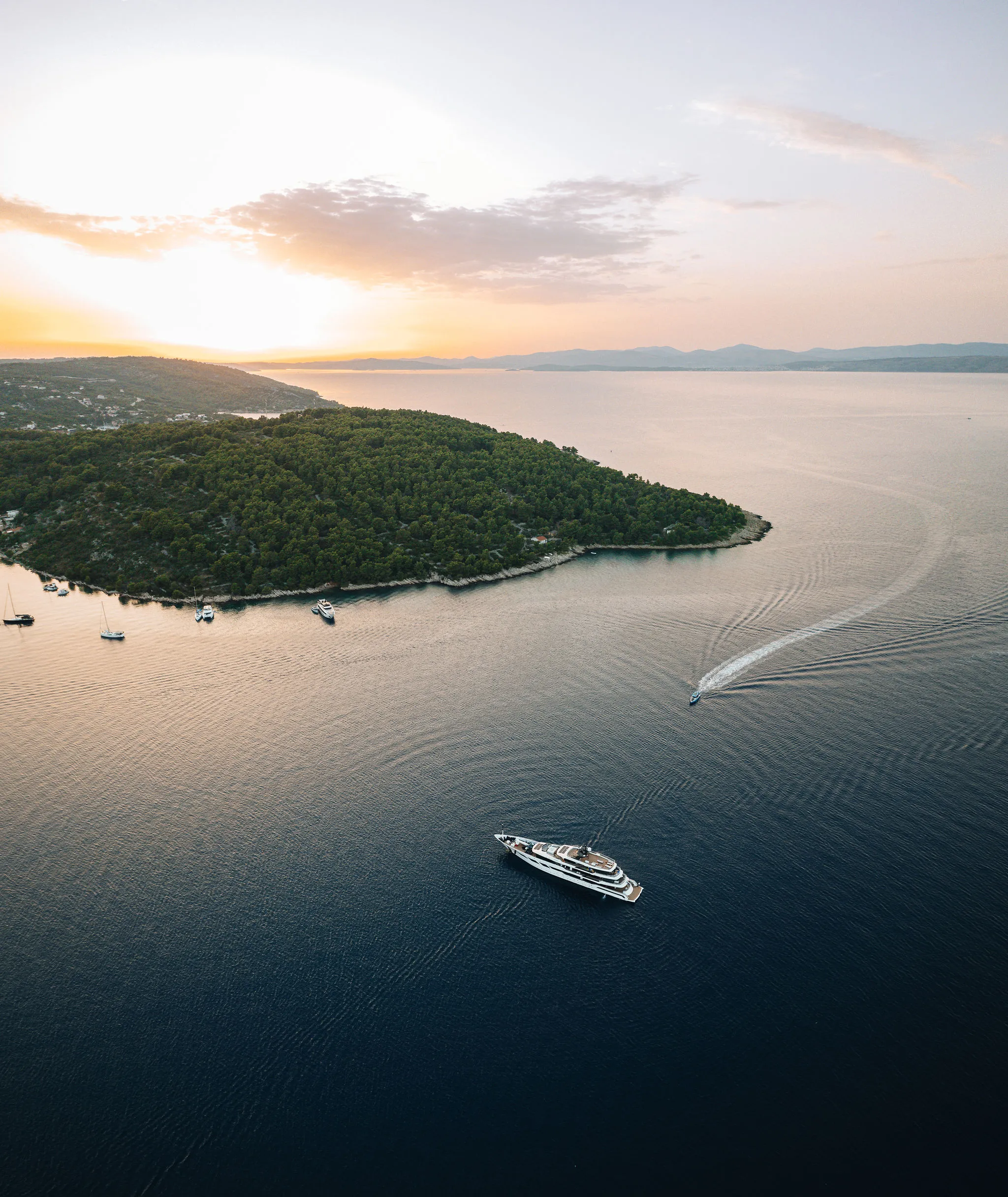 Yacht at sunset with panoramic island views on the Adriatic Sea in Croatia